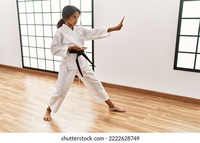 African American Girl Wearing Kimono Training Karate At Sport Center