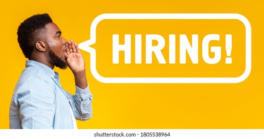 African American guy making announcement HIRING over yellow background, collage. Panorama
