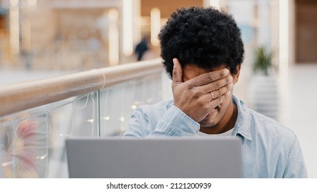 African American Guy Sad Frustrated Upset Disappointed Business Man Losing Online Bets Getting Rejected From Bank Email Problems Loser Male Laptop Stress Low Battery Computer Breakdown Error Mistake