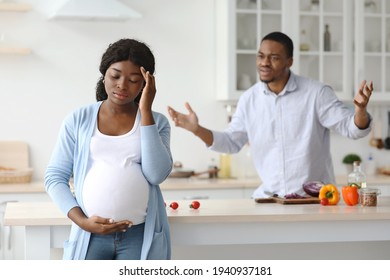 African american guy shouting at his pregnant wife