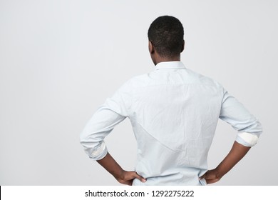 African American Guy, In White Shirt, Turning Back To The Camera As He Is Offended. Look On Future Plans, Preparing For Hard Times.