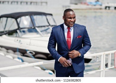 African American Happy Successful Man At Suit Against Yacht. Rich Black Business Man.