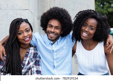 African american hipster man with two beautiful woman - Shutterstock ID 782919154