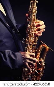 African American jazz musician playing the saxophone, closeup - Shutterstock ID 422406658