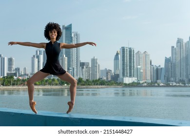 African American latin ballet dancer practicing on street in Panama city, Central America - Powered by Shutterstock