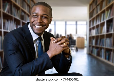 African American Law Attorney Legal Representative With Sincere Genuine Smile In Library