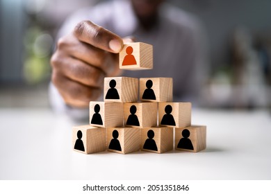 African American Leader Stacking Blocks. HR Leadership Concept