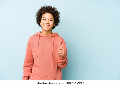 African American Little Boy Isolated Smiling And Raising Thumb Up