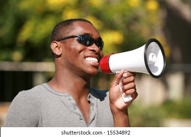 An African American Male Model Uses A Megaphone To Get His Message Heard Loud And Clear