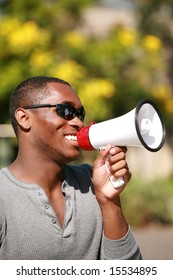 An African American Male Model Uses A Megaphone To Get His Message Heard Loud And Clear