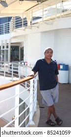 African American Male Relaxing On A Cruise Ship Vacation.