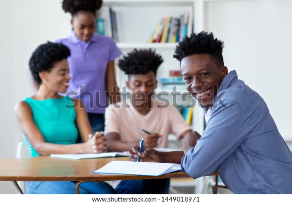 African American Male Student Learning Desk Stock Photo 1449018971 ...