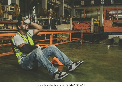 African American Male Worker With Right Arm Injury Wears Cast Can't Work Has To Take Sick Leave For Medical Treatment : Male Workers Insured Against Work Accidents That Occur In Factories.