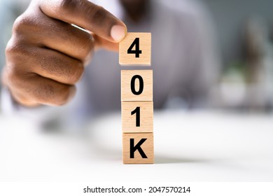 African American Man With 401K Blocks. Income Money Investment
