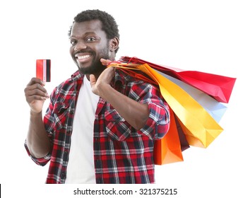 African American Man With Colorful Paper Bags And Credit Card Isolated On White