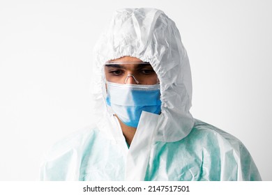 African American Man Doctor In Medical Protective Gown And Mask On White Background