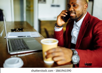 African American Man Getting Online Education And Drinks Coffee To Go Frop Paper Eco Cup