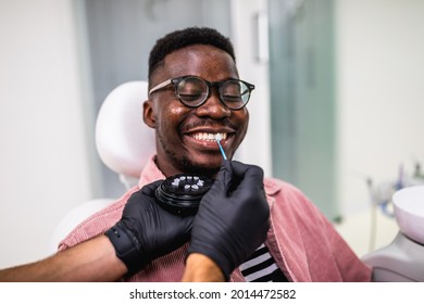 African American man having dental treatment with lumineers at dentist's office. - Shutterstock ID 2014472582