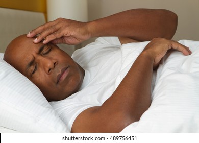 African American Man Having Trouble Sleeping.