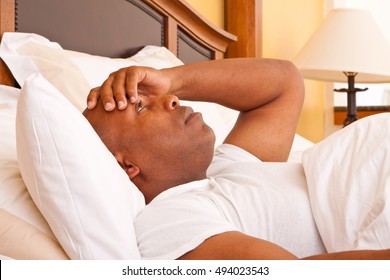 African American Man Having Trouble Sleeping.