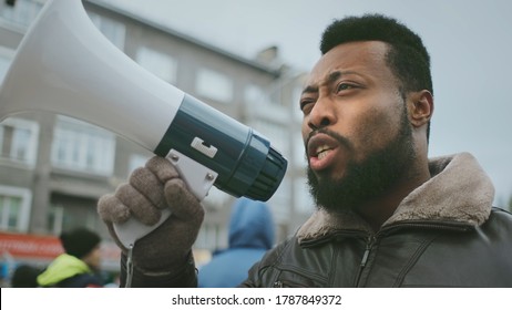 African american man hold megaphone hand. Shout out. Political rally. Social activists speack outdoor against. Resistance rebellion. Rebellious requirement activity.