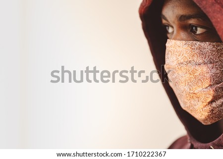 african american man in homemade handmade face mask