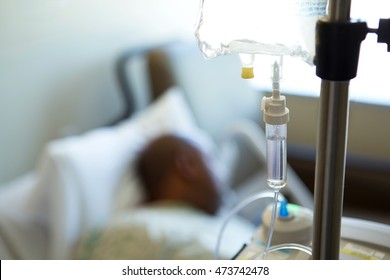 African American Man In A Hospital Bed.