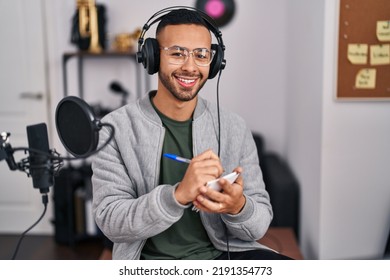 African American Man Musician Composing Song At Music Studio