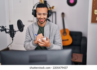 African American Man Musician Composing Song At Music Studio