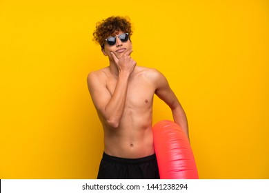 African American Man Over Isolated Purple Wall Laughing