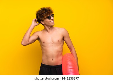 African American Man Over Isolated Purple Wall Laughing