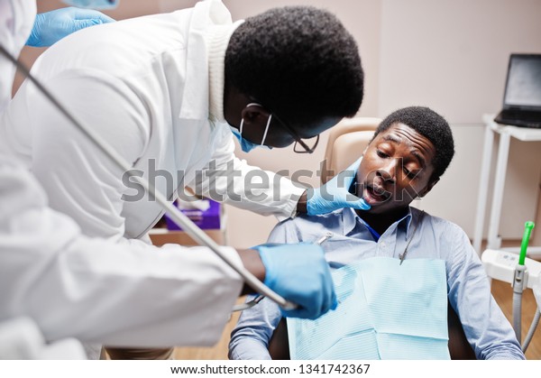 African American Man Patient Dental Chair Stock Photo (Edit Now) 1341742367
