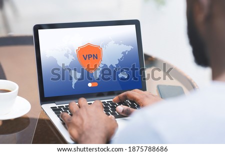 African American Man Using Laptop Computer With VPN Virtual Private Network Connection For Syber Security And Personal Data Protection, Black Guy Sitting At Table In Cafe, Creative Collage