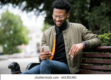 African American Man Using Phone
