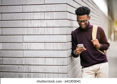African American Man Using Phone