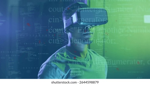 African American man wearing VR headset exploring scene in green blue studio, with floating code. Technology, virtual reality, immersion, futuristic, digital, innovation, entertainment