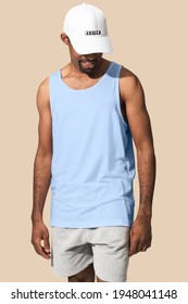 African American Man Wearing White Tank Top With White Cap