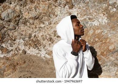 African American Man In White Hoodie Posing Outdoor Photoshoot