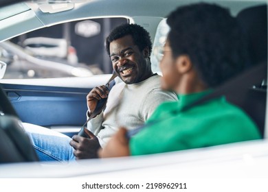 African American Man And Woman Couple Driving Car At Street