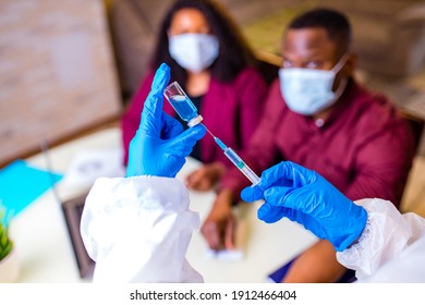 African American Man And Woman Wear Medical Mask And Stylish Marsala Jacket Getting Coronavirus Vaccine