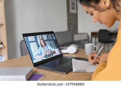 African American mixed race adult student having virtual meeting online call educational webinar chatting with senior teacher at home office writing notes. Video e learning conference call on pc. - Shutterstock ID 1979340005