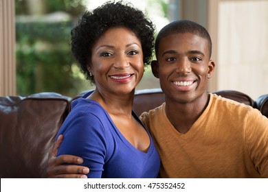 African American Mother And Adult Son.