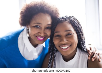 An African American Mother And Daughter Close Portrait