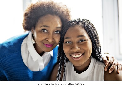 An African American mother and daughter close portrait