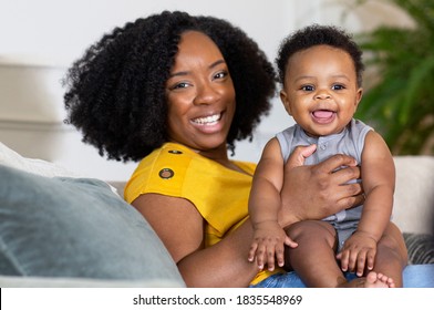 African American mother holding her son