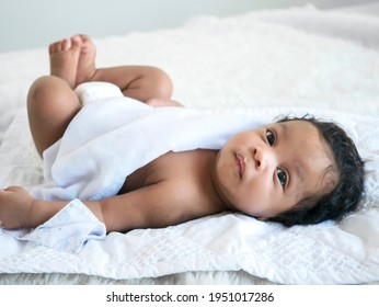 African American Newborn Boy Looking.