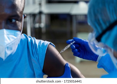 African American Patient Injected Coronavirus Covid 19 Vaccine With Synige Labelled Coronavirus Covid 19