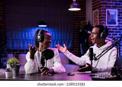 African American People Chatting On Podcast Talk Show, Recording Live Content With Sound Equipment In Studio. Man And Woman Broadcasting Online Discussion For Channel Audience.