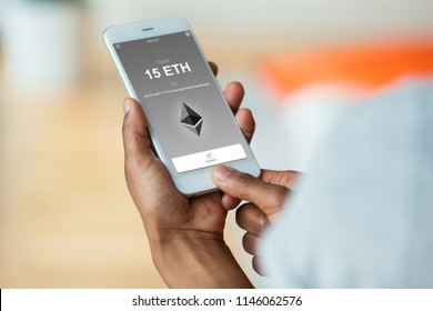 African American Person Sending A Ethereum Crypto Transaction Using  Mobile Phone Wallet - Black People