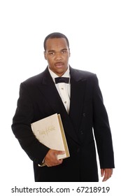 African American preacher holding a bible, isolated over white